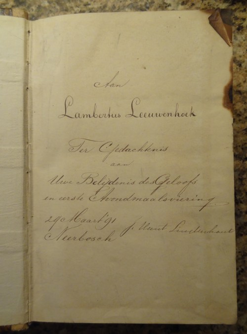 The writing inside the front of the larger Bible